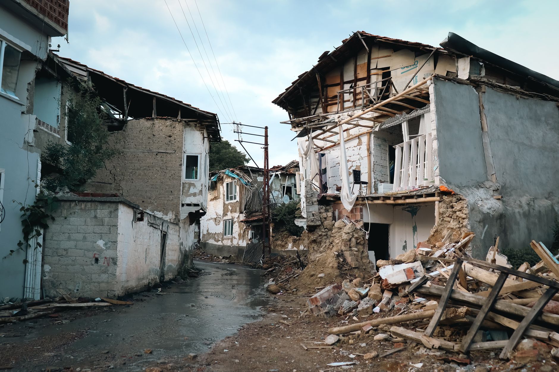 Destroyed buildings in an urban area after an earthquake.