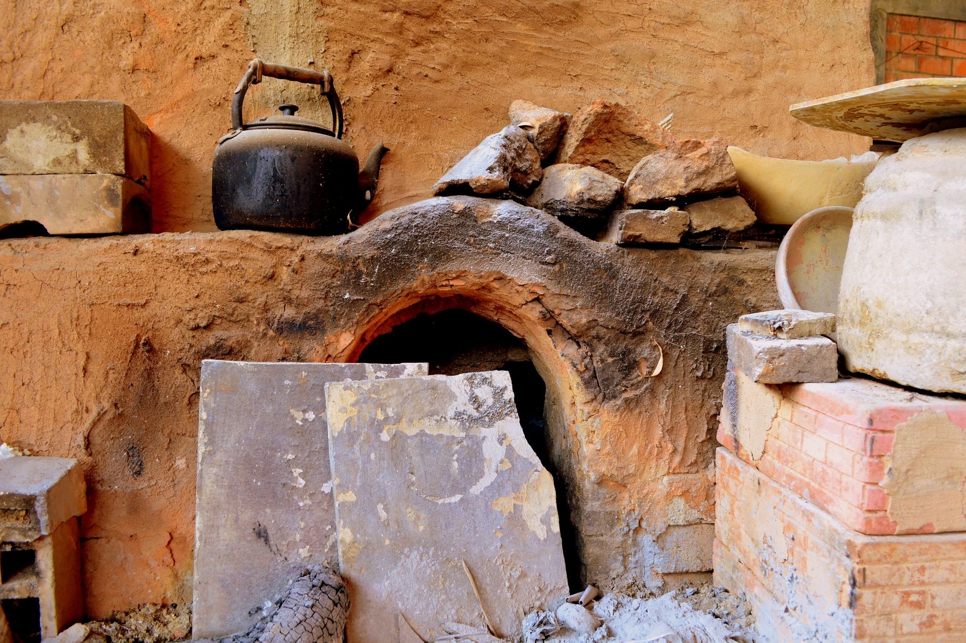 A rustic scene of a traditional clay oven in West Java, Indonesia, showcasing cultural heritage.